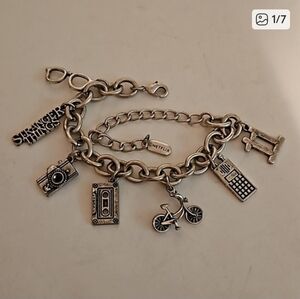 NETFLIX STRANGER THINGS Silvertone Charm Bracelet w/ 7 Charms.